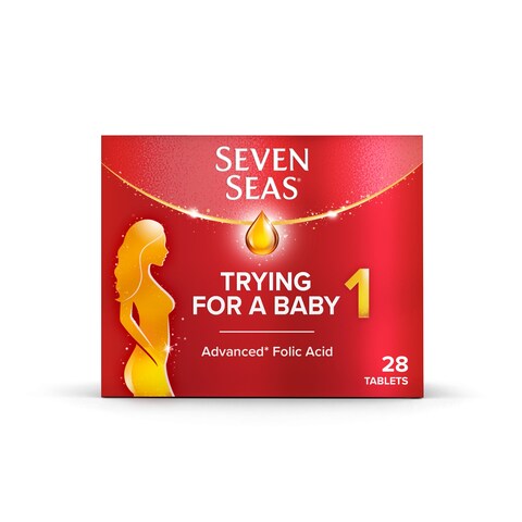 A red box of Seven Seas Trying for a Baby Prenatal Vitamins (28s) features a gold pregnant woman silhouette. This supplement supports fertility with advanced folic acid tablets, highlighted by a prominent 1 on the front.