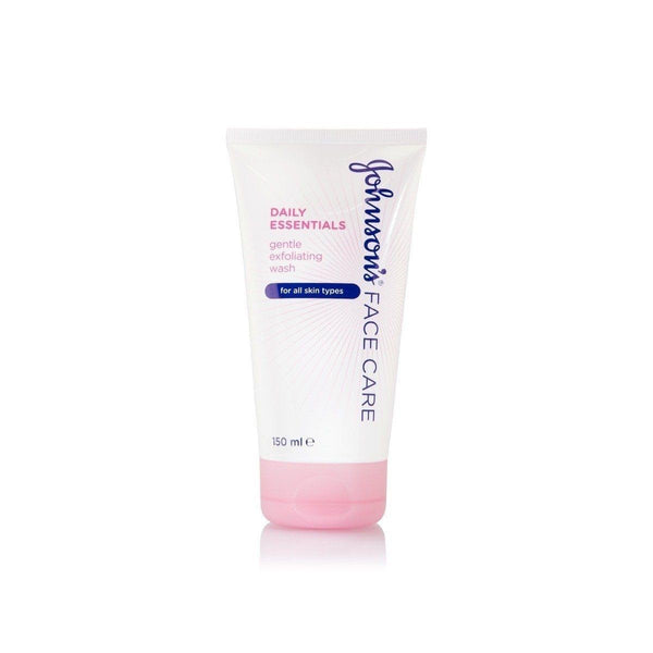 A white and pink tube labeled Johnsons Daily Essentials Gentle Exfoliating Wash (150ml), enriched with skin-loving minerals and suitable for sensitive and all skin types.