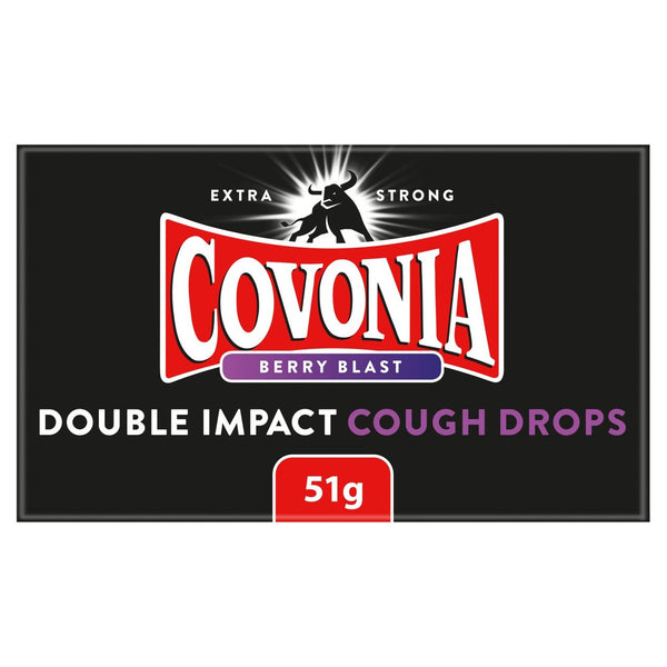 The image shows a pack of Covonia Double Impact Drops - Berry Blast (30g), ideal for soothing sore throats. The black packaging with red and white text prominently displays Extra Strong. Enjoy the menthol vapor relief in every drop.