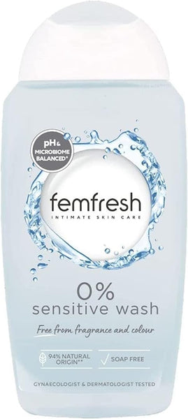 A 250ml bottle of Femfresh Intimate Skin Care 0% Sensitive Wash, pH balanced, fragrance-free, 94% natural origin, and gynecologist tested, with a blue water splash design.