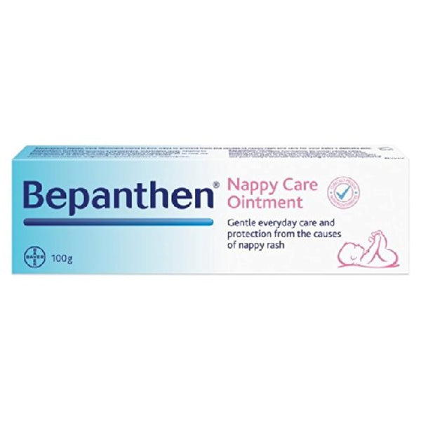 Image of a Bepanthen Ointment (100g) box with soothing pro-vitamin B5. The light-colored packaging displays blue Bepanthen and pink text, alongside a checkmark icon and baby illustration, providing a protective barrier.