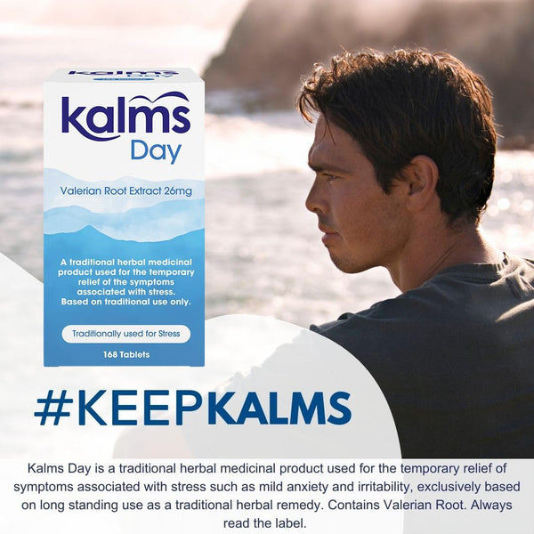 A contemplative person looks out over a beach beside a box of Kalms Day Valerian Root Extract 26mg (168 tablets), highlighted for relieving mild anxiety and stress. Prominent hashtag: #KEEPKALMS.