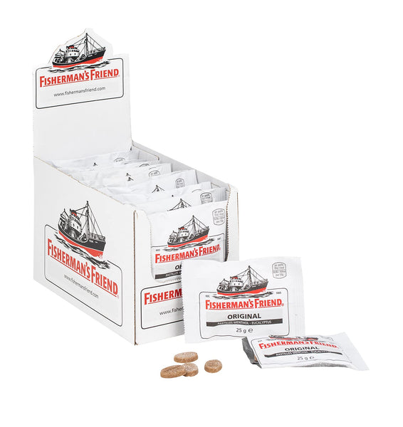 A box of Fishermans Friend Original Menthol Lozenges 25g (24 Packs), with individual white packets and lozenges displayed by the brand Fishermans Friend, arranged on a white surface for soothing cough relief.