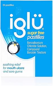 The blue and white packaging of Iglu Sugar Free (24 Pastilles) features a charming penguin graphic and highlights its antiseptic properties. With Benzalkonium Chloride Solution and Compound Benzoin Tincture, it provides soothing relief for mouth ulcers and sore gums.