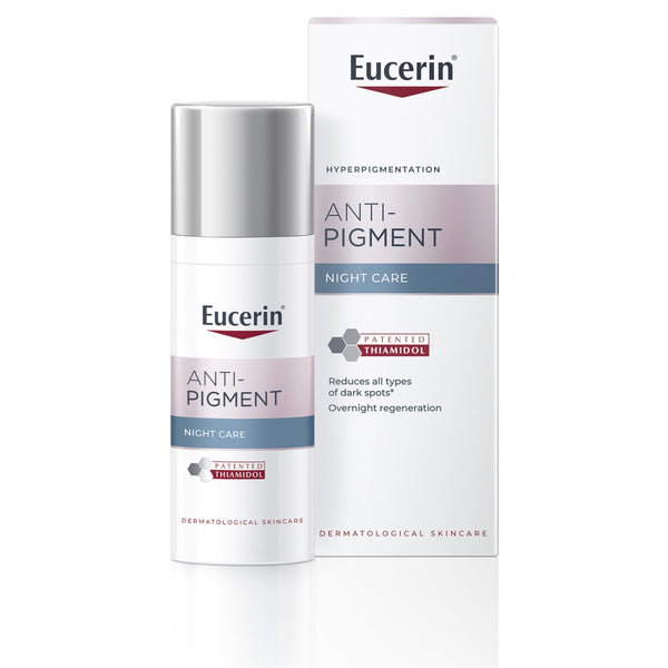 A 50ml bottle and box of Eucerin Anti-Pigment Night Cream, by Eucerin, designed to reduce dark spots and support overnight skin regeneration. The white packaging features silver and pink accents.