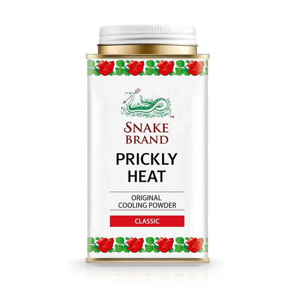 Snake Brand Prickly Heat Cooling Powder (150g) in a white container with red and green floral border and a green snake logo helps soothe prickly heat rash effectively.