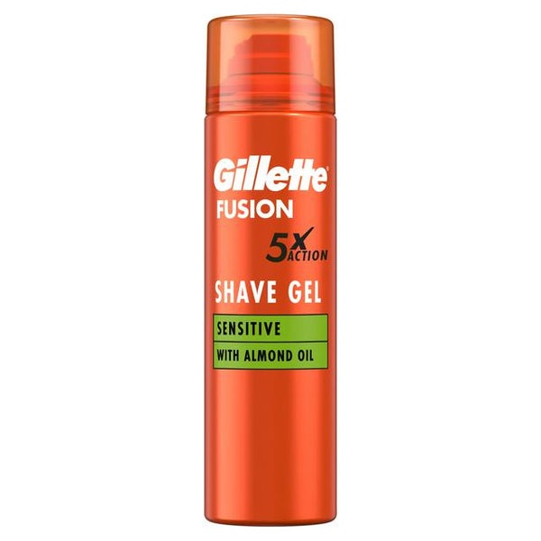 Image of a Gillette Fusion Sensitive Skin Shaving Gel (200ml) canister. The orange design highlights 5X Action and Razor Burn Protection featuring Sensitive with Almond Oil, ideal for sensitive skin.