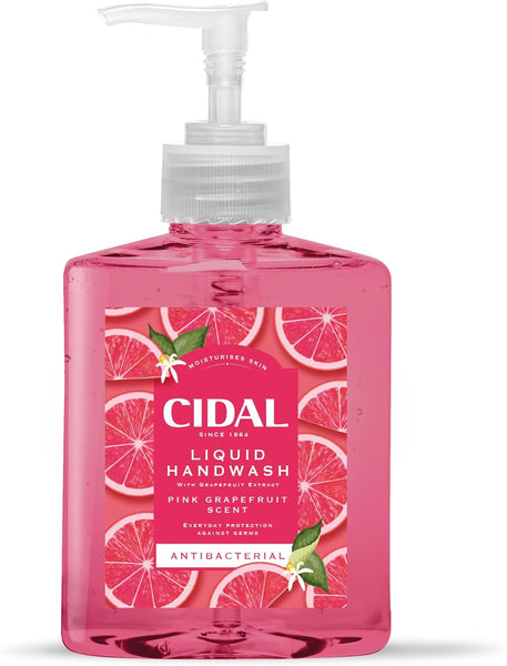 Cidal Pink Antibacterial Liquid Handwash Grapefruit (250ml) features visible pink soap in a clear pump bottle. The label with grapefruit slices and leaves highlights its hygiene-boosting, moisturizing benefits.