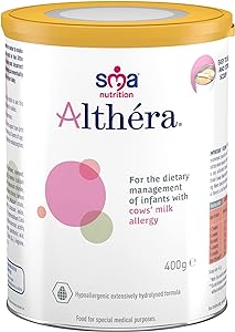 A 400g tub of Sam Nutrition Althera by SMA Nutrition is designed for infants with cows milk protein allergies. It has a yellow lid, colorful circular label designs, and contains hydrolyzed whey protein for easier digestion.