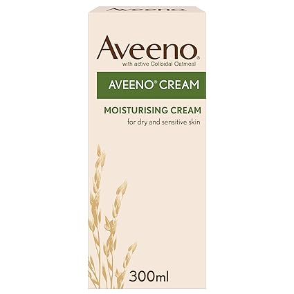 The Aveeno Cream (300ml) box highlights its soothing benefits for dry and sensitive skin with active colloidal oatmeal. An oat graphic on the front emphasizes its nourishing properties.