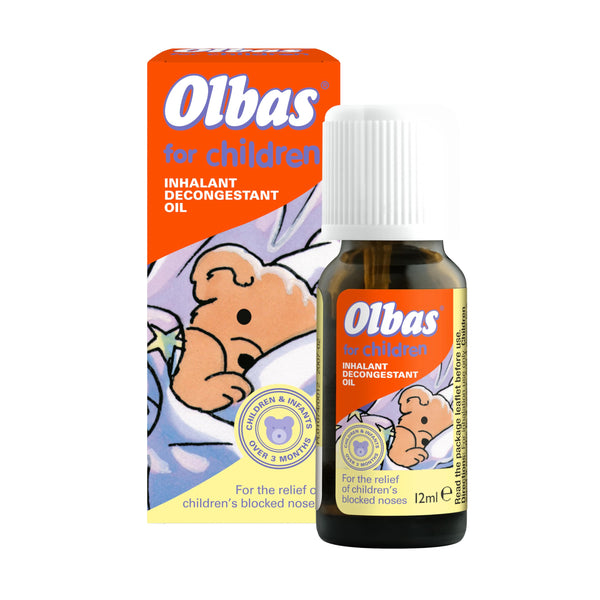 A 12ml bottle of Olbas Oil For Children is displayed in front of its packaging, which shows an illustrated bear wrapped in a blanket. This gentle decongestant is designed to effectively relieve nasal congestion in children.