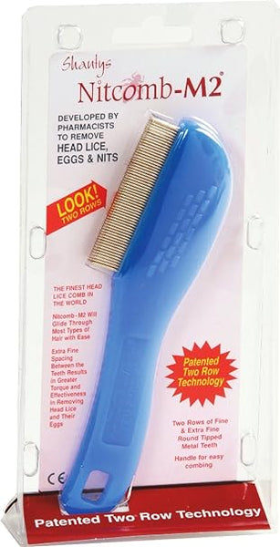 Image of the Shantys Nitcomb-M2 lice comb in packaging, highlighting its blue handle and dual rows of fine metal teeth. The package promotes Patented Two Row Technology, designed by pharmacists to efficiently remove lice, eggs, and nits.