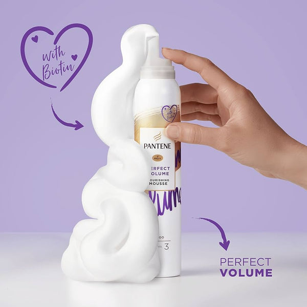 A hand dispenses Pantene Pro-V Mousse Perfect Volume - Level 3 (200ml), creating a large swirl of white foam. Purple text emphasizes with Biotin, Perfect Volume, and the flexible hold offered by this Pantene mousse.