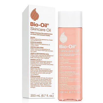 A Bio-Oil Skincare Oil (200ml) bottle is shown beside its packaging, highlighting the PurCellin Oil formula to effectively address scars, uneven skin tone, aging skin, and dehydration.
