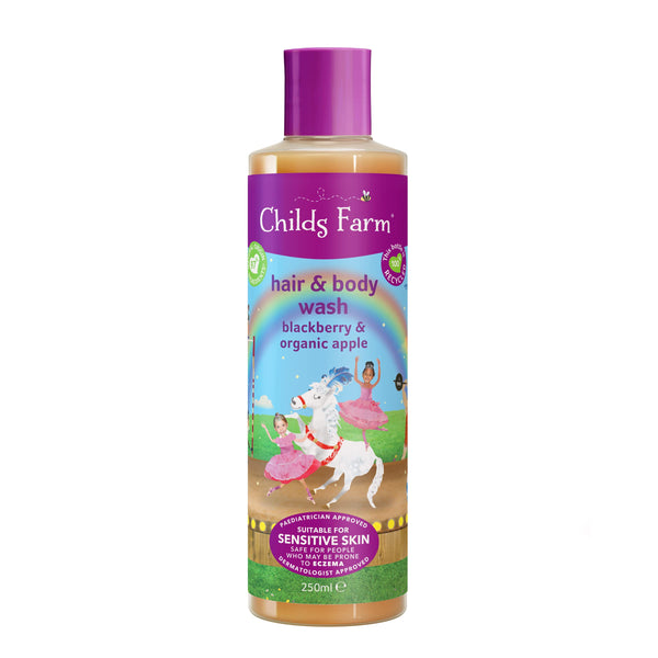 Childs Farm Kids Hair & Body Wash features a purple label with a ballerina and unicorn, infused with blackberry and organic apple for sensitive skin. It has a purple cap and comes in a 250ml bottle.