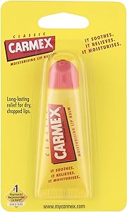 A yellow blister pack of Carmex Original Tube with a pink cap and red-and-white label, offering long-lasting relief while moisturizing and soothing dry, chapped lips.