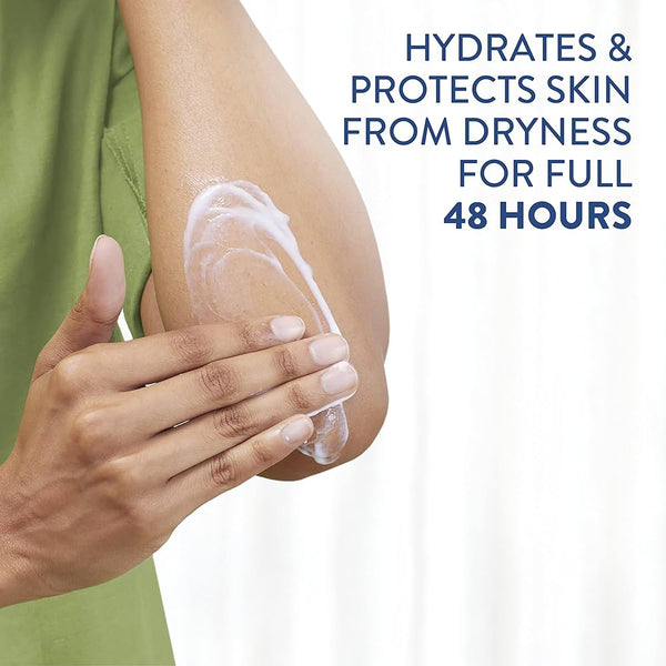 Wearing a green shirt, someone applies Cetaphil Moisturising Cream (450g) to their elbow. The text states, Hydrates & Protects Dry Sensitive Skin for Full 48-Hour Hydration.