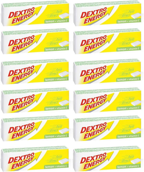 Twenty-four packs of Dextro Energy Tablets-Lemon are neatly arrayed in a grid. Each pack, adorned with a yellow lightning design and the DEXTRO ENERGY label, offers a quick boost with dextrose and vitamin C.