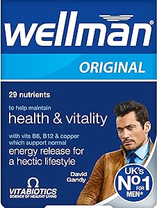The blue packaging of Vitabiotics Wellman Original Tablets (30 count) features a man in a brown jacket. With 29 nutrients like vitamins B6, B12, and copper, it enhances immunity and energy for mens health. The label proudly states its UKs No 1 for Men by Vitabiotics.