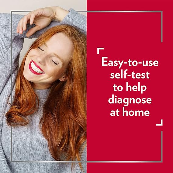 A red-haired person in a gray sweater smiles with a hand behind their head. Next to them, text on a red background states: Canestest Self-Test for BV & Thrush by Canesten – An easy 10-second vaginal infection test for home diagnosis.