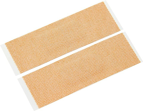 Two Elastoplast Waterproof Fabric Plasters on a white background, made from stretchable fabric. The bandages have a textured beige surface with white tabs for easy application, making them essential for any first aid kit.