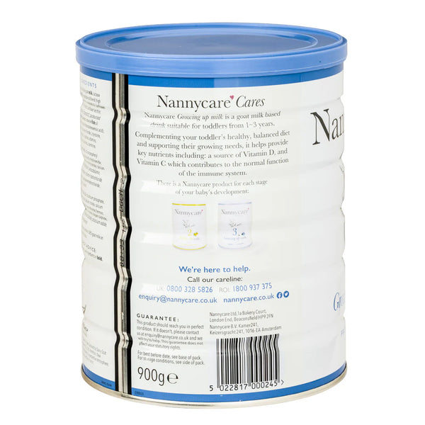A 900g canister of Nannycare Growing Up Milk 3 for toddlers, with a blue lid and white label displaying product info, contact details, and two small product images.