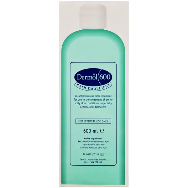 A 600 ml clear plastic bottle containing a green liquid labeled Dermol Bath Emollient from the Dermol brand, ideal for treating dry skin and eczema, provides nourishment and soothing relief.
