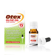 A box and bottle of Otex Olive Oil Ear Drops (10ml) by Otex with a dropper beside the bottle, featuring packaging that states it helps soften and lubricate ear wax and is clinically recommended.