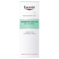 Eucerin DermoPurifyer Oil Control Adjunctive Soothing Cream (50ml) features green and white packaging with red accents, highlighting its purpose as a gentle acne treatment for blemish-prone skin.