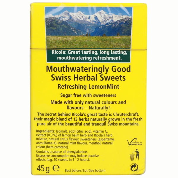 Ricola Swiss Herbal Sweets Sugar-Free Lemon Mint (45g) come in a yellow box with a mountain scene, highlighting natural ingredients. Enjoy the classic Swiss taste of these sugar-free sweets with sweeteners from Ricola.