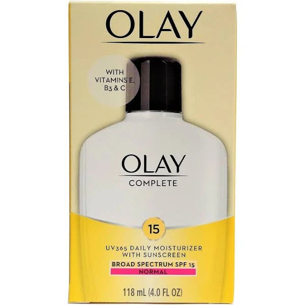 A box of Olay Complete SPF15 Light Day Lotion Care Moisturising (100ml) is displayed, featuring vitamins E, B3, and C. The package offers sun protection for normal skin with a non-greasy formula partially visible.