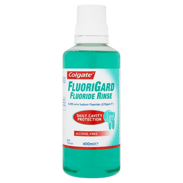 This 400ml Colgate Fluorigard Alcohol-Free Mouth Rinse features a green liquid and mint flavor. Its label highlights sodium fluoride content for daily cavity protection.