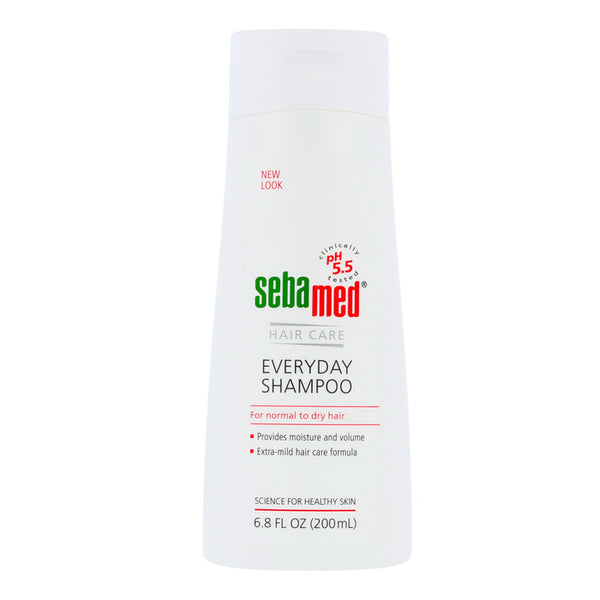 The Sebamed Shampoo 200ml, ideal for normal to dry hair and sensitive scalps, offers a pH of 5.5. Its extra-mild formula maintains moisture balance and enhances volume, ensuring healthy, dandruff-free hair. The white bottle holds 6.8 fl oz (200 ml).