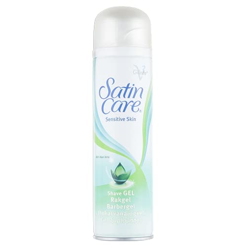 Gillettes Satin Care Shaving Gel Sensitive (200ml) is expertly designed for smooth razor glide, with a white can accented in soothing light green and blue. It features an Aloe Vera leaf graphic, highlighting its suitability for delicate skin.