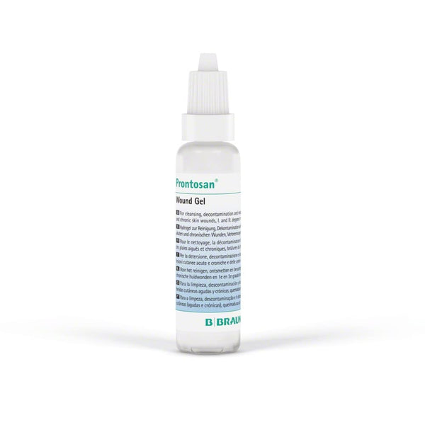 A small white bottle with a pointed nozzle cap labeled Prontosan Wound Gel by Braun stands upright on a white background. This wound care essential, available in multiple languages, offers antimicrobial properties.