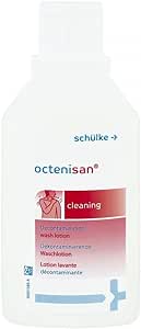 The Octenisan Antimicrobial (500Ml) bottle has a white and red label with text and graphics. Enriched with octenidine and emollients, it features a white cap and is designed by the Octenisan brand for decontaminating and gentle cleansing.