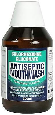 The Peppermint Ecolab Chlorhexidine Antiseptic Mouthwash (300ml) features a refreshing peppermint flavor. This Ecolab brand product contains a 0.2% solution for treating and preventing gum disease, promoting excellent oral health.