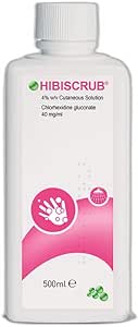 A white plastic bottle of Hibiscrub Antibacterial Skin Cleanser (500ml) with 4% chlorhexidine gluconate has a pink label showing a hand being washed, designed to effectively kill germs.