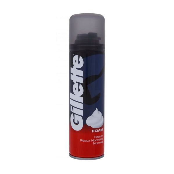 A 200 ml can of Gillette Classic Mens Shaving Foam features a red and blue design with Gillette in bold white letters, a creamy lather graphic at the bottom, and a black cap highlighting its Comfort Glide Formula.