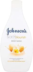 A 400ml bottle of Johnsons Soft & Nourish Body Wash from Johnson and Johnson, enriched with almond oil and a jasmine scent. The white bottle features almonds and jasmine on the label, with blue and gold text accents.