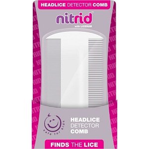 A pink and white Nitrid Comb package displays an ergonomic design and cheerful face icon with Finds the Lice text. Gentle for childrens hair, this comb efficiently detects lice while detangling and styling.