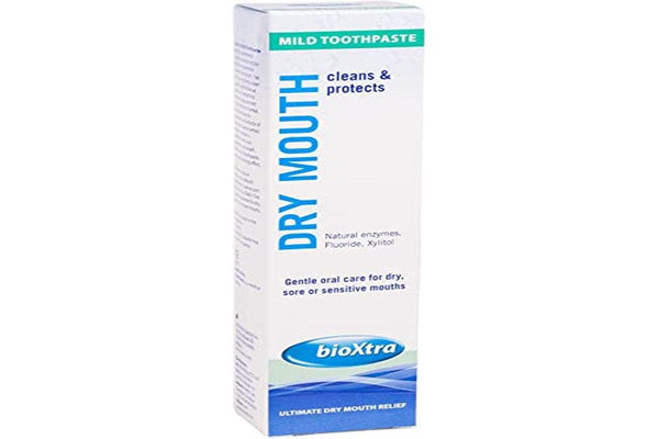 Biopharm Bioxtra Dry Mouth Toothpaste (50ml) by Bioxtra offers cleans & protects benefits with natural salivary enzymes, fluoride, and xylitol, gently caring for dry, sore, or sensitive mouths while promising ultimate relief as noted on the packaging.