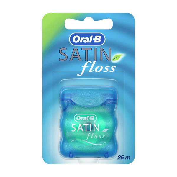 The Oral-B Satin Floss is packaged in a blue container within a plastic and cardboard package featuring a green and blue gradient design. The text states Oral-B Satin Floss, 25m, with mint freshness, accompanied by a leaf icon next to floss.