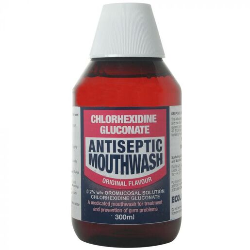 A red and white 300ml bottle of Ecolabs Original Chlorhexidine Gluconate Antiseptic Mouthwash, Original Flavour, for gum problem prevention and oral hygiene treatment.