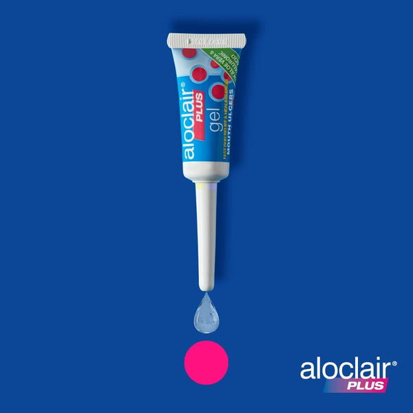 An 8ml tube of Aloclair Plus Mouth Ulcer Gel on a blue background shows a droplet from its nozzle. The brand, recognized for oral care and ulcer relief, is visible in the lower right corner.