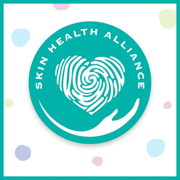 A teal circle logo with Skin Health Alliance text and a heart-shaped fingerprint above a stylized hand, surrounded by pastel dots on a white background—perfectly reflecting the gentle care you can trust from Pampers Fresh Clean Baby Wipes (52 Pack).