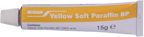 A 15g tube of Ecolabs Yellow Soft Paraffin BP sits on a white background, featuring 100% yellow soft paraffin BP for superior skin protection. The pharmaceutical-grade product is sealed with a white cap on the left side.