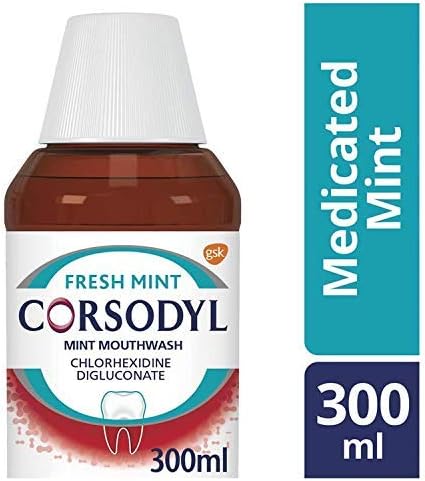 Image showcasing a 300ml bottle of Corsodyl Alcohol-Free Mint Mouthwash featuring Chlorhexidine Digluconate. With a tooth icon, the label reads Fresh Mint and Medicated Mint. The prominent logo underlines its gum disease effectiveness with volume and product details included.