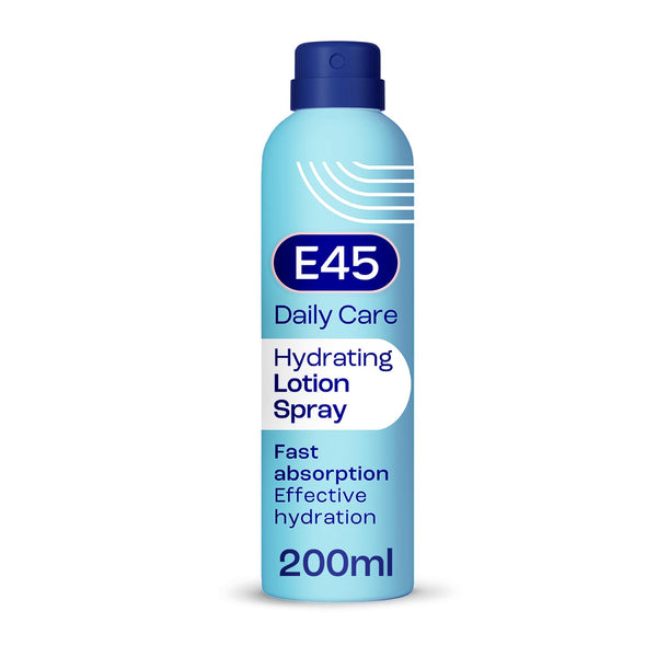 The E45 Hydrating Lotion Spray (200ml) features a blue bottle with a dark blue cap, labeled Fast absorption and Effective hydration. Its ideal for dry, sensitive skin and dermatologically tested for gentle care.