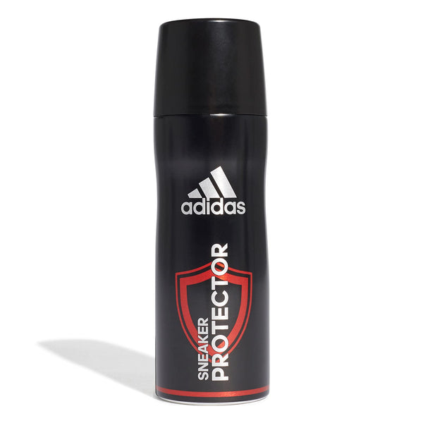 A black 200ml aerosol can of Adidas Sport Protector Waterproof Shoe Care Spray stands upright on a white background, featuring a red shield graphic and white text, offering protection for athletic footwear.